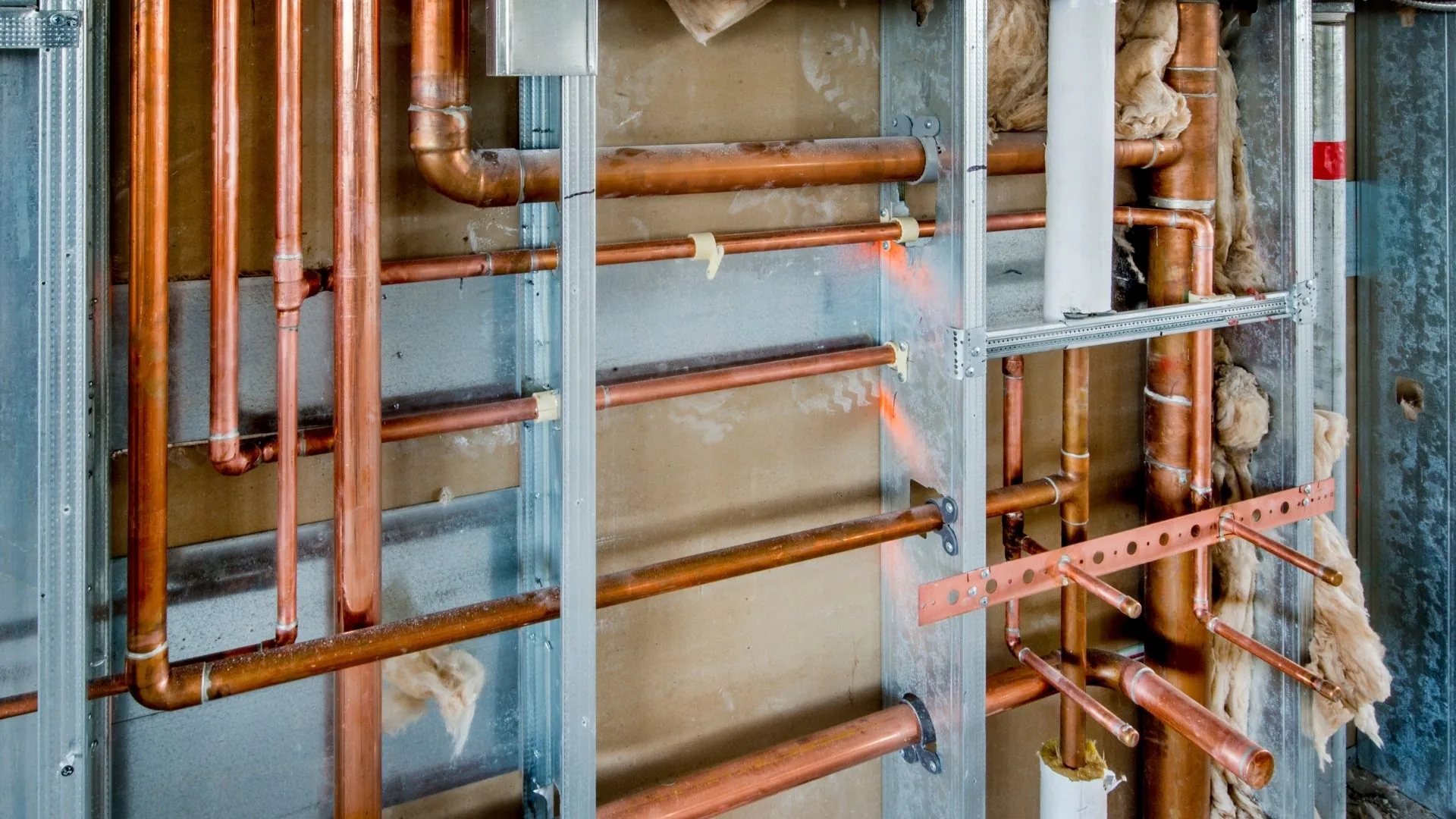 Ethos Plumbing technician performing toilet repair